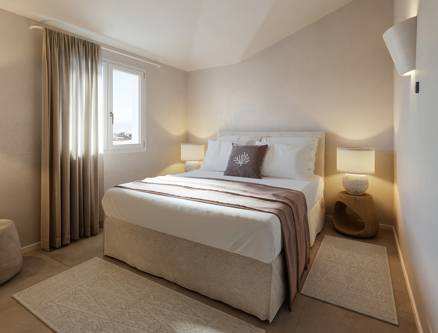 La zona notte è separata da una porta per garantire privacy e tranquillità. Le due camere matrimoniali sono luminose e affacciate sul verde circostante.